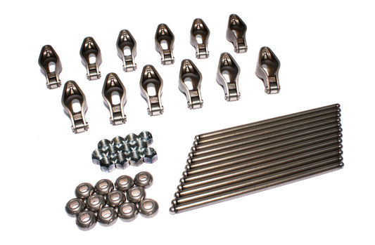 COMP Cams Magnum rocker arm and pushrod kit showing metal rocker arms and pushrods for high-performance engine upgrade.