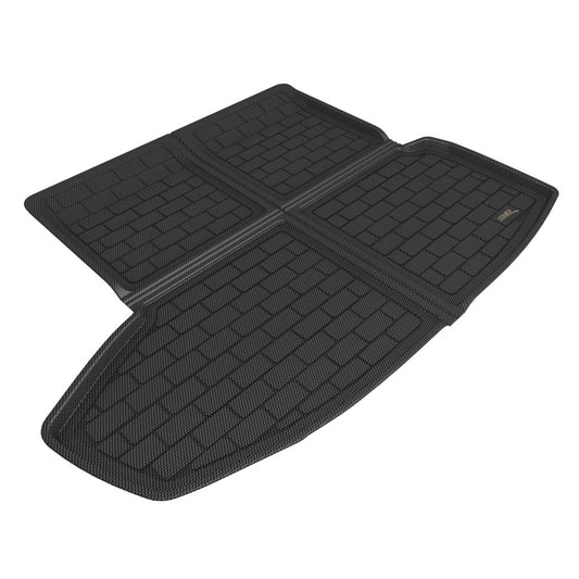 Black 3D MAXpider cargo liner for Tesla Model S 2021-2022, rubber floor mats with textured surface and raised edges.