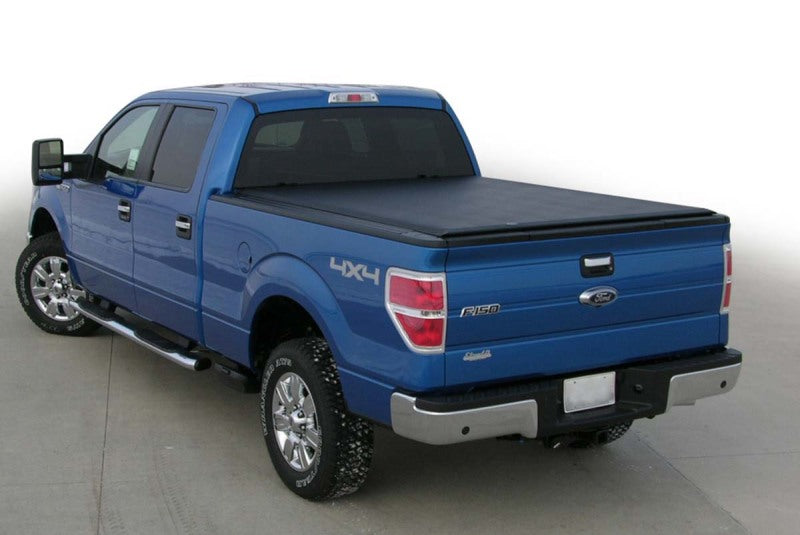 Access Lorado 2022+ Toyota Tundra 5ft 6in bed roll-up cover with deck rail, exterior truck bed accessory in black fabric and metal rails.