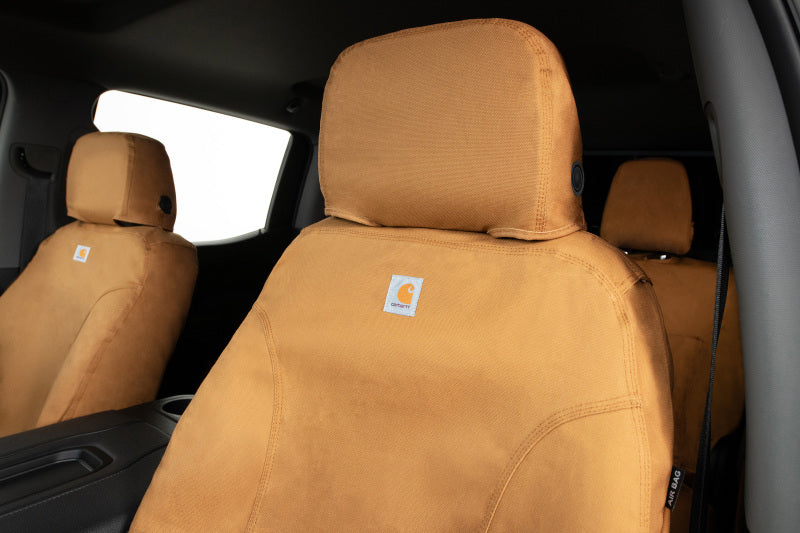 Covercraft Carhartt seat covers for Dodge Nitro front seats, custom-fit upholstery with durable fabric and detailed stitching.