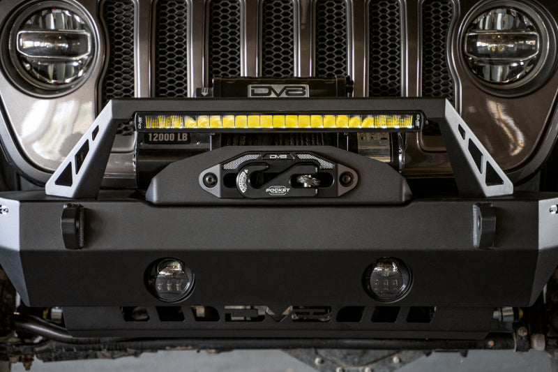 Steel DV8 Offroad FS-25 Stubby front bumper with plated bull bar for Jeep Wrangler and Gladiator JT/JK/JL vehicles.