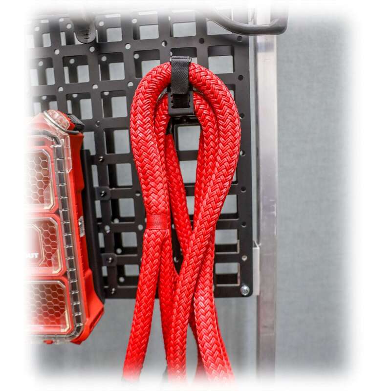TURN Offroad Molle adjustable hook mounted on off-road vehicle, versatile utility hook for gear organization and secure attachment.