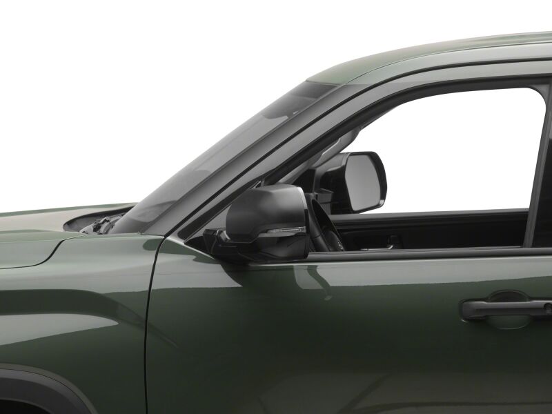 Raxiom 22-26 Toyota Tundra side mirrors with clear sequential LED mirror lights, showing the illuminated LED strips on the mirror edges.