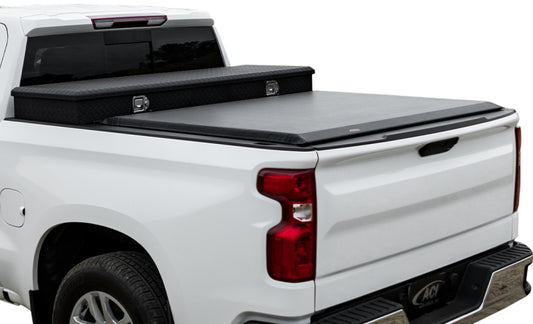 Access 2022+ Toyota Tundra 8ft 1in bed roll-up toolbox cover with deck rails, securing the truck bed with a durable roll-up design.