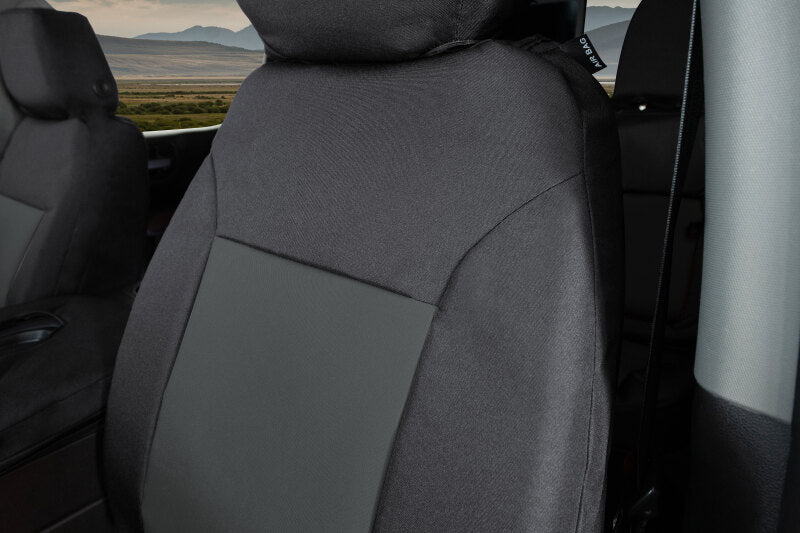 Covercraft black and charcoal custom second row seat covers for Ford Escape 2021-2024, made with durable Endura PrecisionFit fabric.