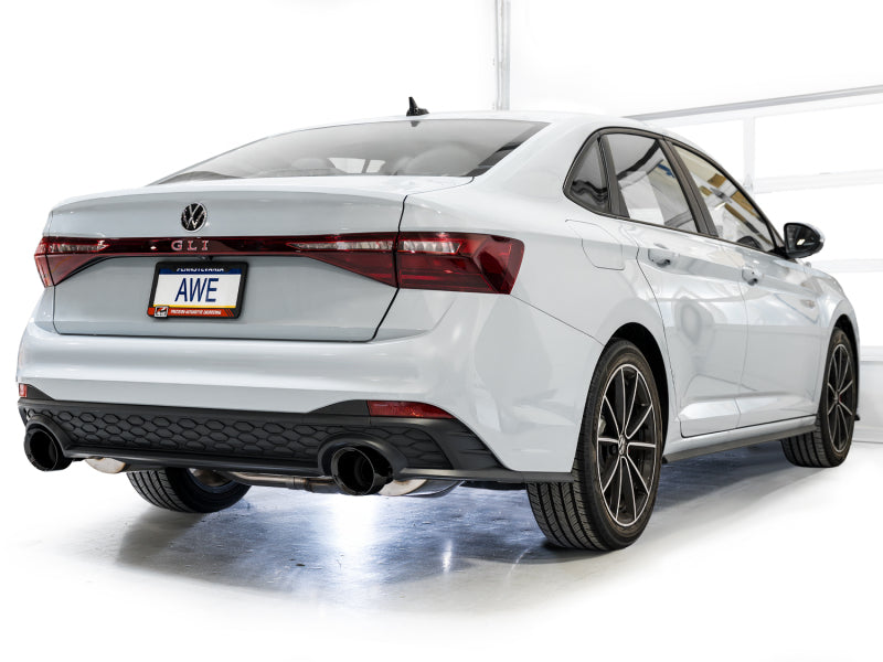 AWE Tuning catback exhaust with diamond black tips installed on a 2022-2025 Volkswagen Jetta GLI Track Edition car.