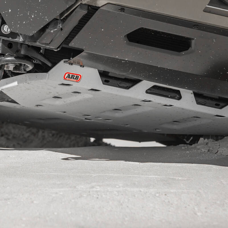ARB 2024+ Toyota Tacoma front skid plate, durable metal protection for off-road vehicles, mounted on the front underside.
