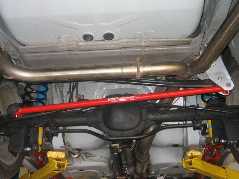 UMI Performance GM F-Body tubular non-adjustable panhard bar shown in close-up, designed for improved suspension stability.