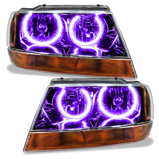 Oracle Lighting black SMD headlights for 1999-2004 Jeep Grand Cherokee with ColorSHIFT and BC1 controller, showing sleek headlight design.