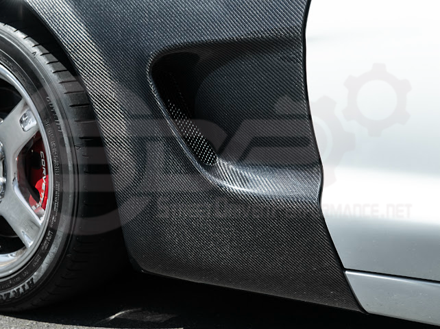 Factory style carbon fiber front and rear widebody fenders for 1997-2004 Chevrolet Corvette C5 by Street Driven Performance.