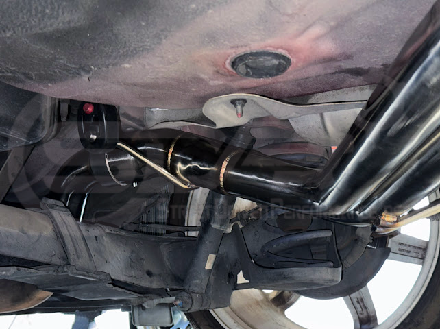 Hyundai Veloster Turbo 2013-2018 exhaust axle back with dual 4-inch tips, available in burnt finish or chrome, by Street Driven Performance.