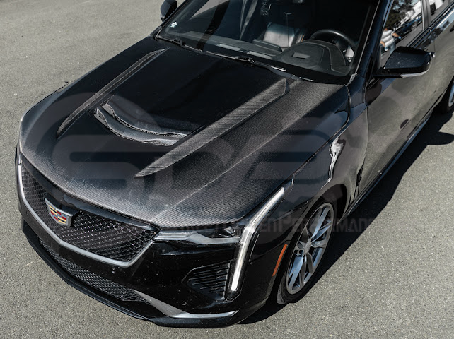 Cadillac CT4 Blackwing style carbon fiber vented front hood for 2020+ models, featuring aggressive design and lightweight construction.