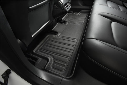 Black 3D MAXpider Mazda CX-50 Kagu 2023+ rubber floor mat with textured surface and raised edges for car interior protection.