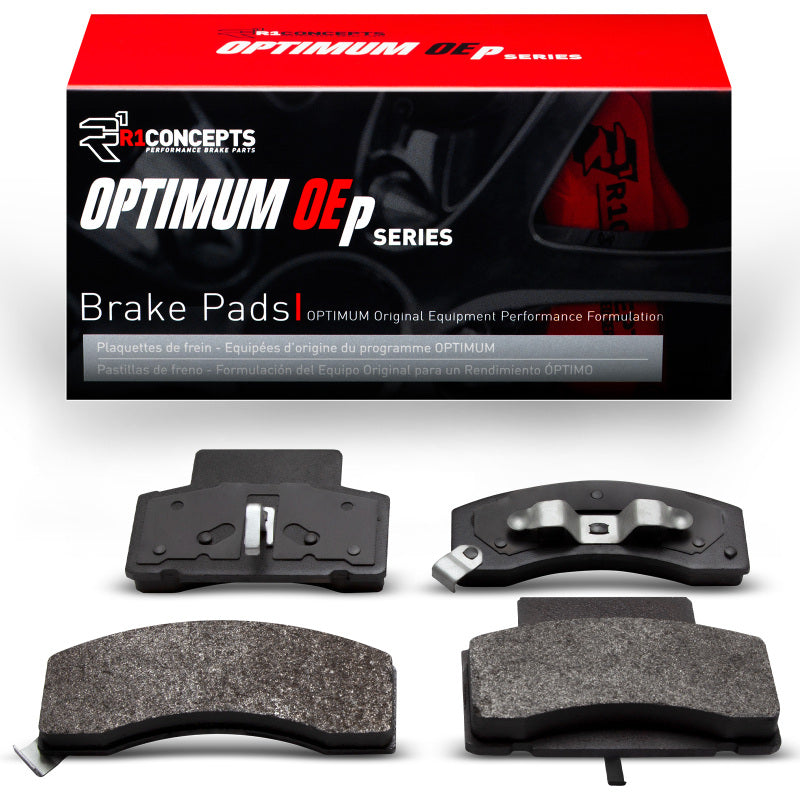 R1 Concepts GMC Savana 3500 front OE brake pads for R1 90-02 model, showing new brake pads installed on vehicle.
