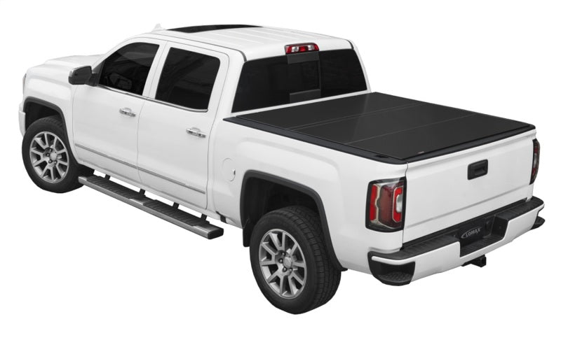 Access LOMAX tri-fold truck bed cover in matte black on a 2020+ Chevy/GMC 2500/3500 full-size 6ft 8in bed.