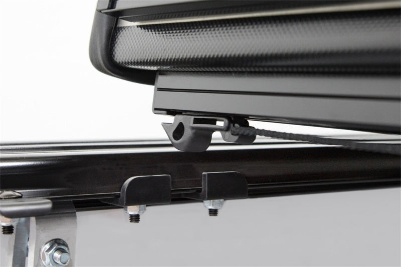 Access LOMAX Pro Series tri-fold hard tonneau cover in black diamond mist for 2007-2013 Chevy/GMC 1500 6ft 6in truck bed