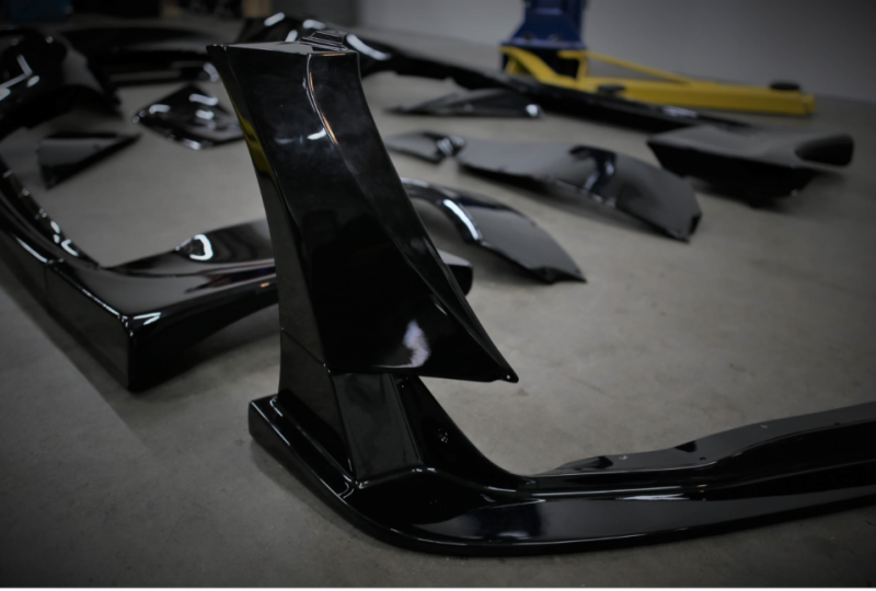HKS Premium body kit for 2020 Toyota Supra A90 GR, front and rear bumper components, without wing, in black finish