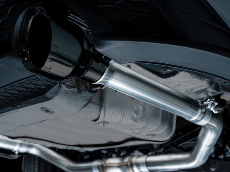 AWE Tuning catback exhaust system with diamond black tips installed on a 2022-2025 Volkswagen Jetta GLI Track Edition.