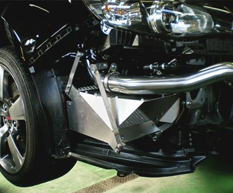 HKS S Type Oil Cooler Kit GRB Black installed on a vehicle, showcasing the sleek black oil cooler for enhanced engine cooling.