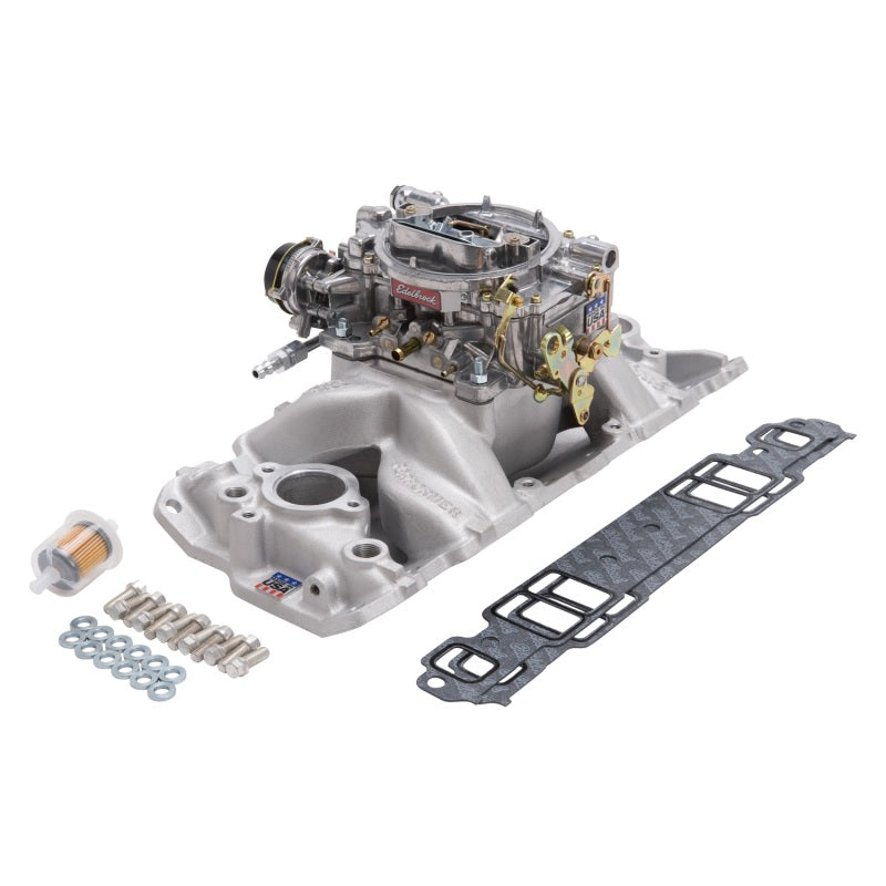 Edelbrock Performer Air-Gap intake manifold and carb kit for small block Chevrolet 1957-1986, natural finish, shown on engine.