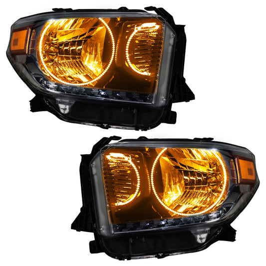 Oracle Lighting Toyota Tundra headlight with dual halo SMD LEDs and ColorSHIFT BC1 controller, showcasing modern truck headlight design.