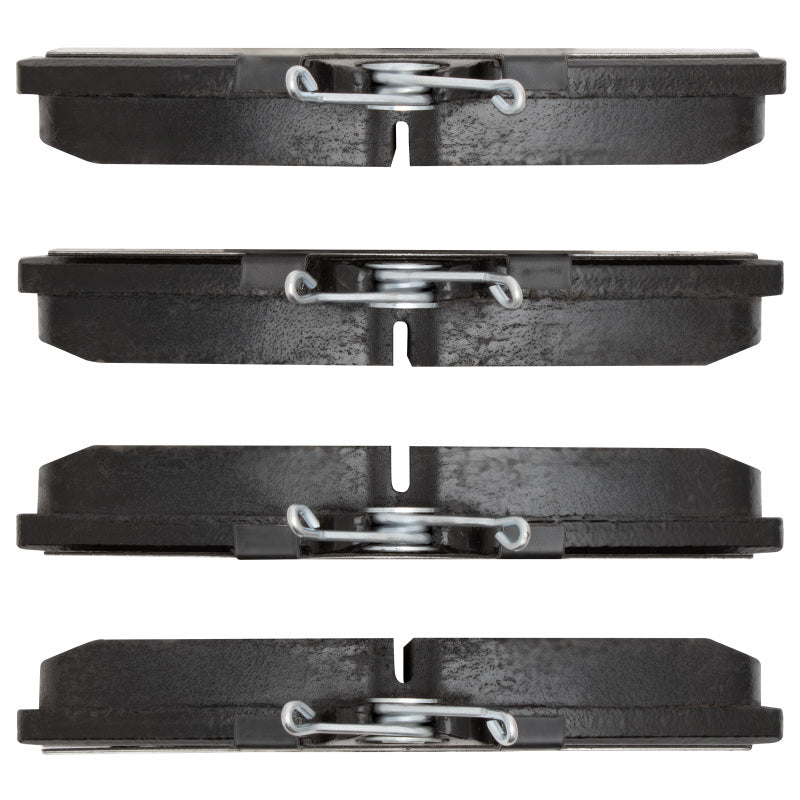 R1 Concepts OE semi-metallic front brake pads for Mercury Cougar 1993-2007, showing the brake pad set with metal backing plates.