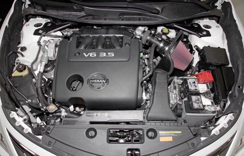 K&N 69 Series Typhoon cold air intake kit for 2013-2014 Nissan Altima and Pathfinder 3.5L V6 engine, showing the intake components.