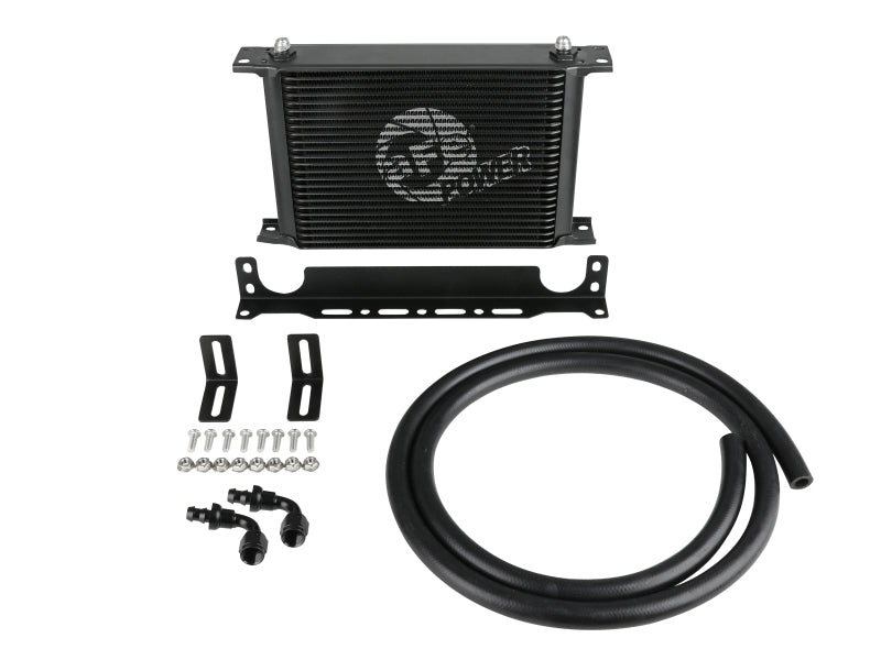 aFe BladeRunner transmission oil cooler with 10-inch length, 2-inch width, and 8-inch height, featuring cooling fins and inlet/outlet ports.