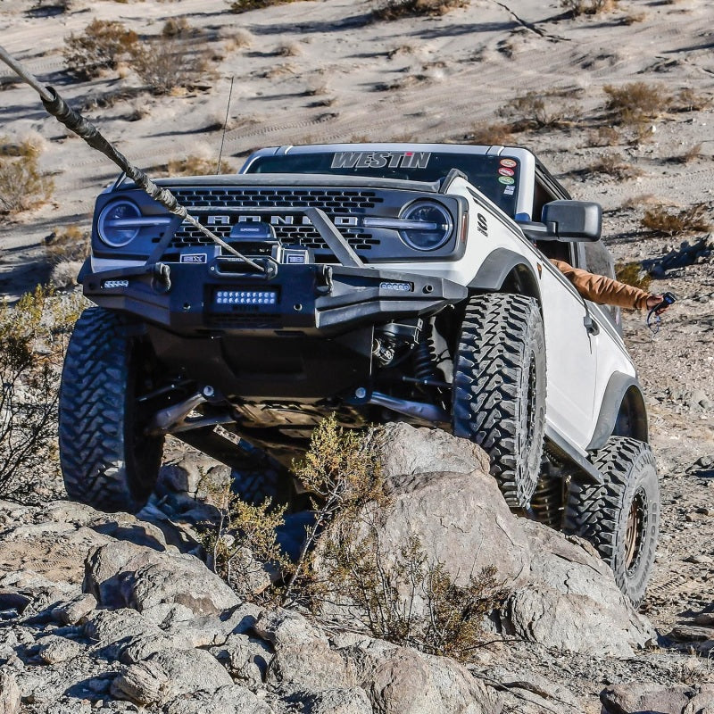 Westin textured black skid plate for 2021-2023 Ford Bronco, excluding Bronco Sport, designed to protect the underside of the vehicle.