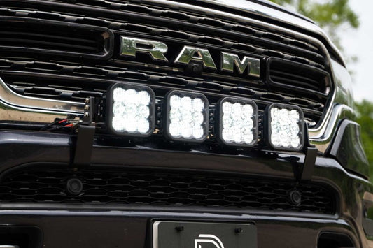 Diode Dynamics SS5 Grille CrossLink Lightbar Kit with yellow and white LEDs installed on a 2019-present Ram Sport grille.