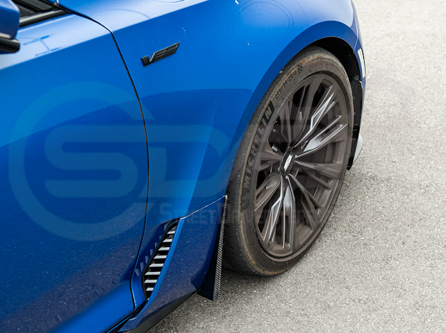 Pair of carbon fiber mud flaps for 2022-up Cadillac CT5-V Blackwing by Street Driven Performance, front and rear splash guards.