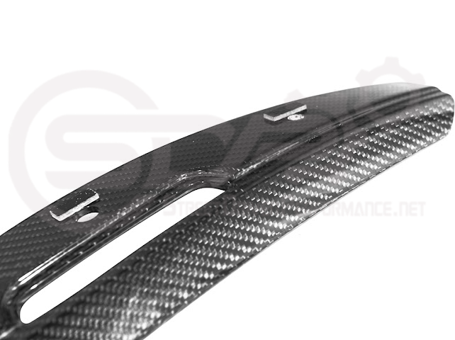 Cadillac CT5-V Blackwing factory OEM style carbon fiber front lip splitter with ground effects and wheel arches for sporty enhancement.