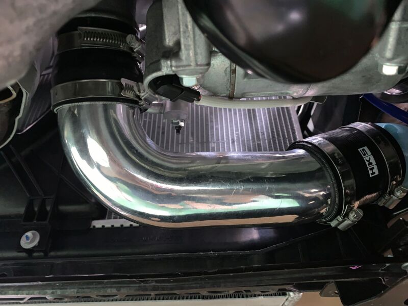 HKS Honda Civic Type R FL5 intercooler kit showing the large aluminum intercooler with HKS branding and piping for improved cooling.