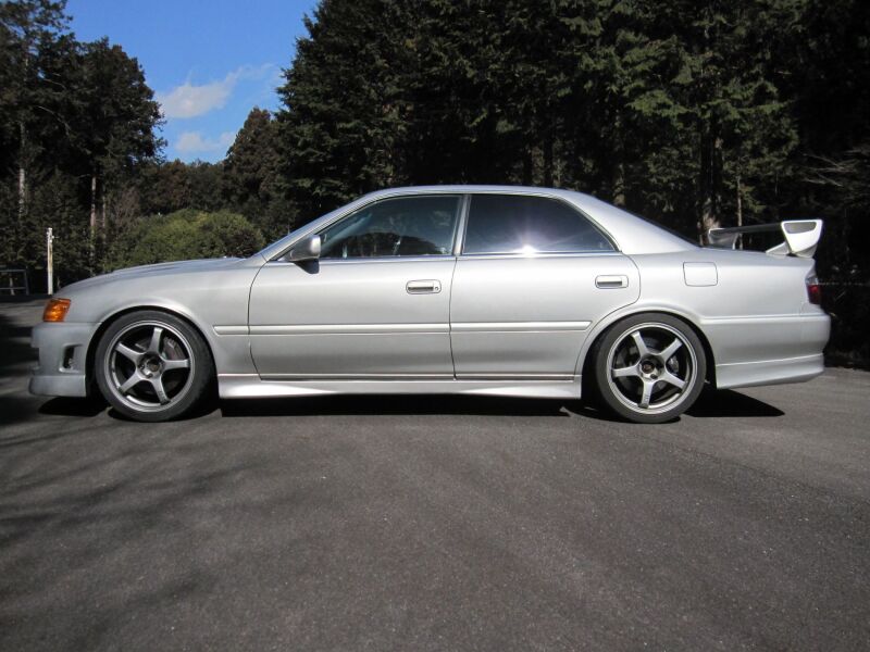 HKS HIPERMAX S coilover kit for JZX100, detailed image showing adjustable shock absorbers and suspension components.