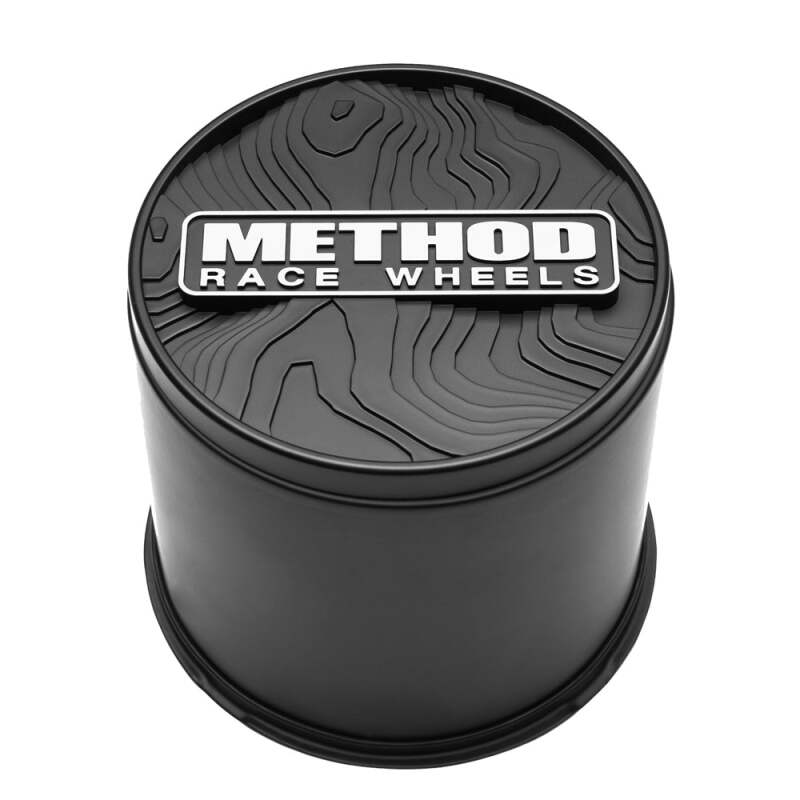 Black Method Race Wheels top push-through center cap, 130mm diameter, designed for wheel centers, with a sleek finish.