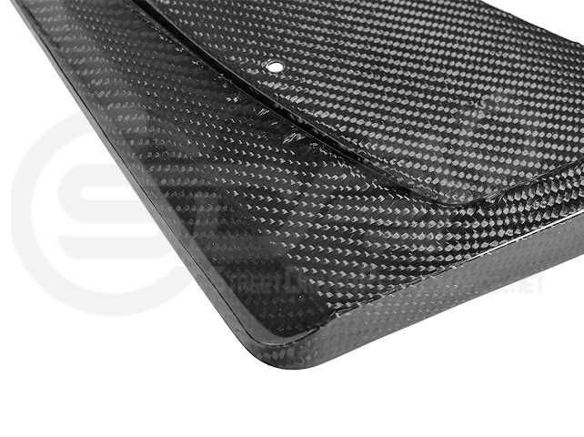 Pair of black carbon fiber mud flaps for 2022-up Cadillac CT5-V Blackwing, designed to protect the vehicle from road debris.