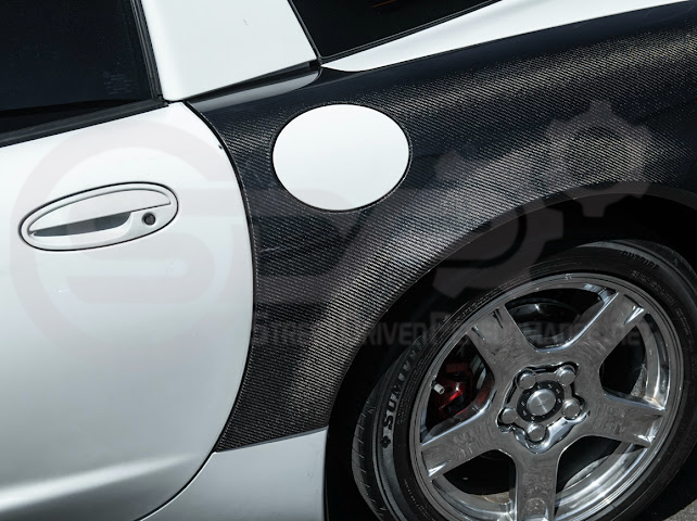 Factory style carbon fiber front and rear widebody fenders for 1997-2004 Chevrolet Corvette C5 hatchback by Street Driven Performance.