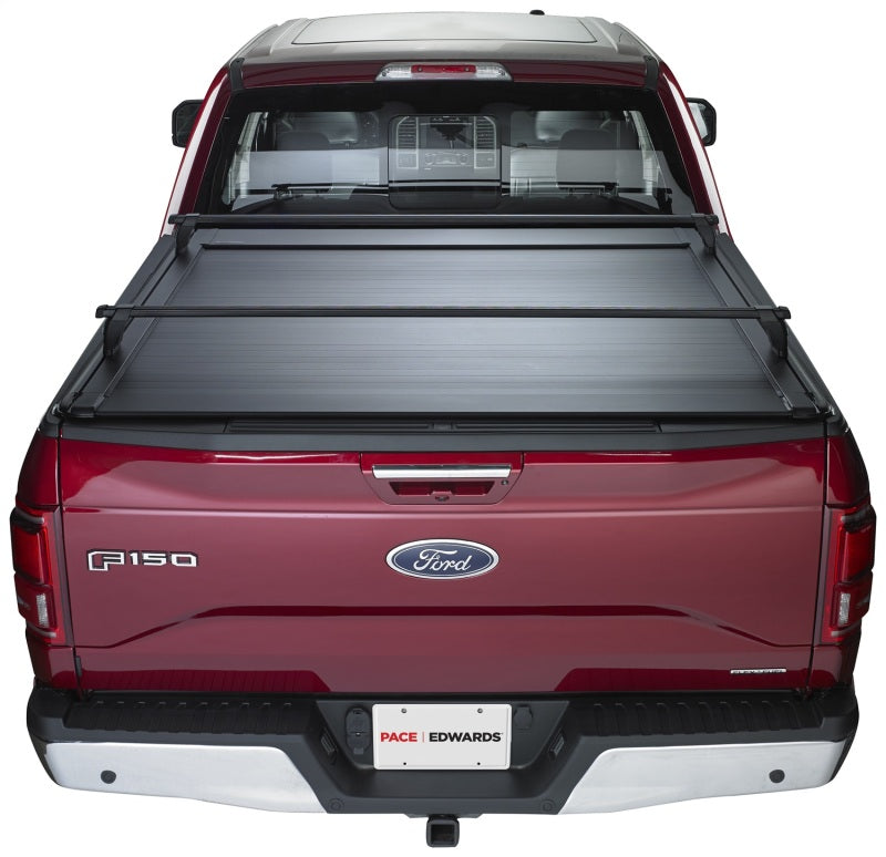 Pace Edwards UltraGroove retractable bed cover on a 2017 Ford F-Series Super Duty 6ft 9in truck bed, metal construction, closed position.