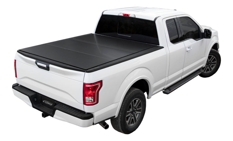 Access LOMAX Tri-Fold Cover for 2010-2018 Dodge RAM 1500 with 6ft 4in bed, carbon fiber exterior truck bed accessory.