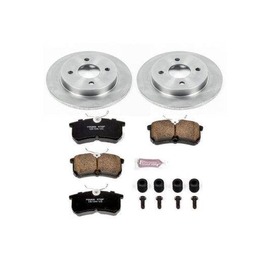 PowerStop rear Autospecialty brake kit for Ford Fiesta 2014-2019, showing brake calipers and rotors installed on the vehicle.