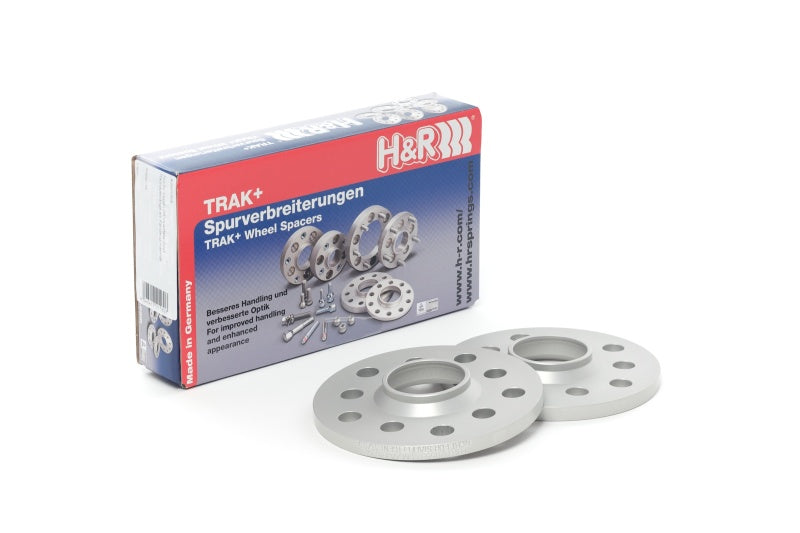 H&R Trak+ 15mm DRS wheel spacer bolt for 5/114.3 bolt pattern, 70.5 center bore, 14x1.5 stud thread, shown on vehicle wheel