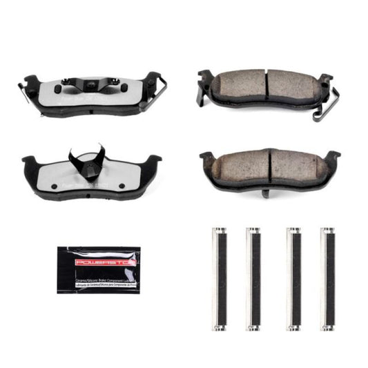 PowerStop Z36 truck and tow rear brake pads with hardware for 2004-2010 Infiniti QX56, designed for performance and durability.