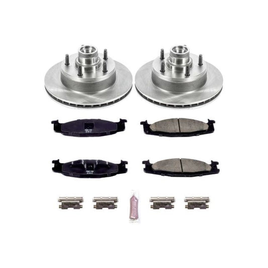 PowerStop OE front brake kit for 2003 Ford E-150 van, including brake rotors and pads, installed on vehicle.