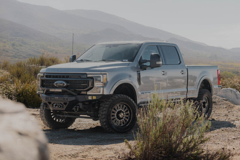 Steel front bumper for Ford Super Duty F-250/F-350 from DV8 Offroad Spec Series, designed for durability and off-road protection.