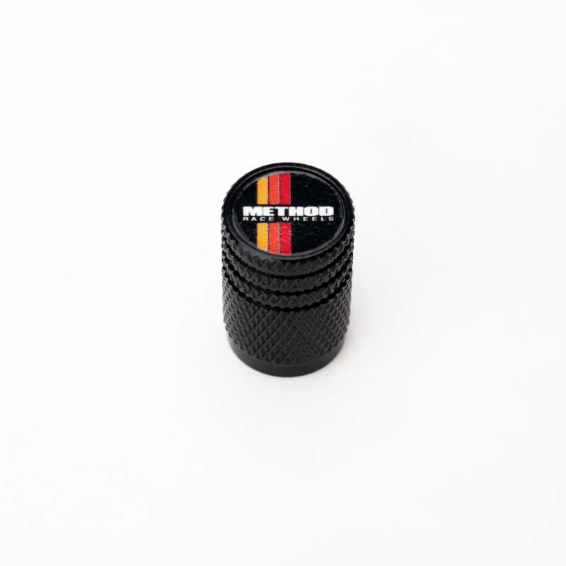 Set of five Method Wheels valve stem caps with classic stripe design, durable metal construction for automotive tire maintenance.