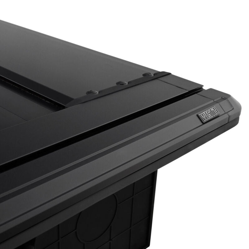 Westin electric retractable tonneau cover on a 2019-2026 Ram 1500 with a 6.4ft bed, black finish, and sleek design.