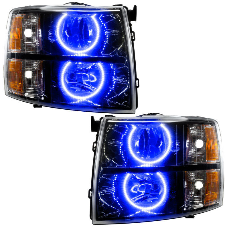 Oracle Lighting blue round halo headlights for 2007-2013 Chevrolet Silverado, assembled LED headlights with blue halo accents.