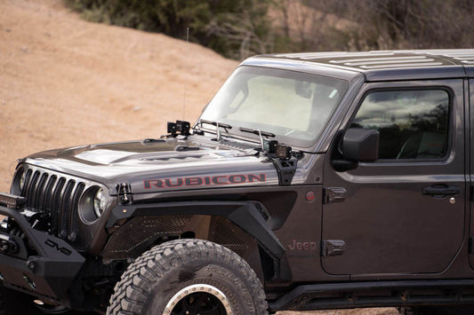 DV8 Offroad Jeep Gladiator JT cowl light bar bracket mounted on vehicle, showcasing durable off-road light mount for Jeep Gladiator.