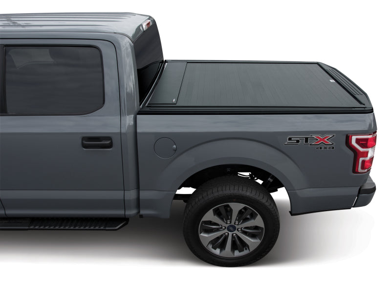 Pace Edwards BedLocker retractable bed cover on a 2015 Chevy Silverado 1500 with matte finish, fits 6ft 6in truck bed.