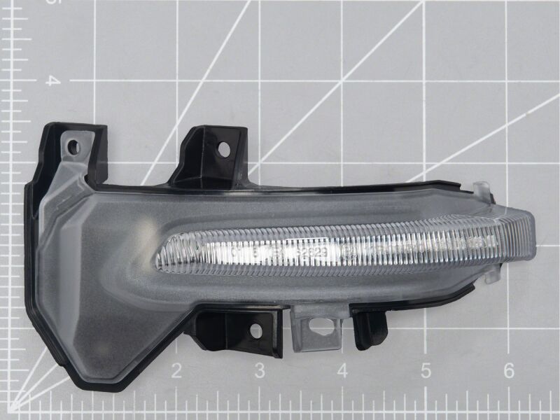 Raxiom 22-26 Toyota Tundra side mirrors with clear sequential LED mirror lights, showcasing modern automotive lighting.